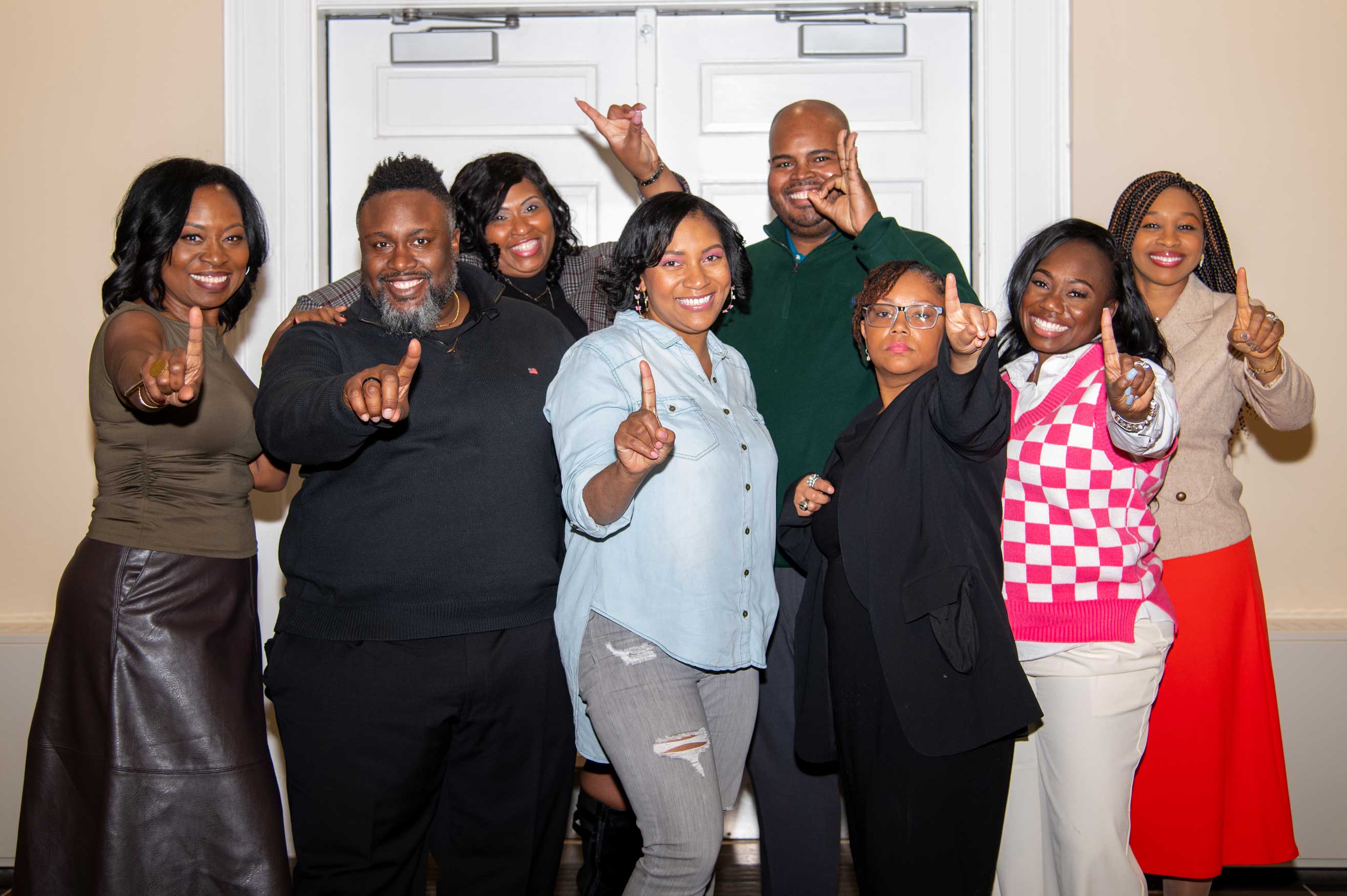 cohort 1 poses with one finger