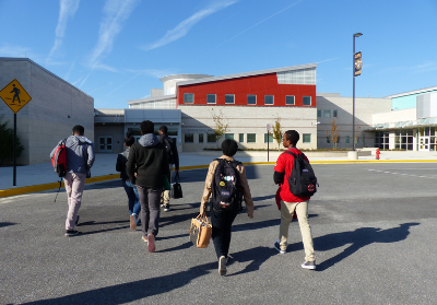 students walking into Oxon Hills High School