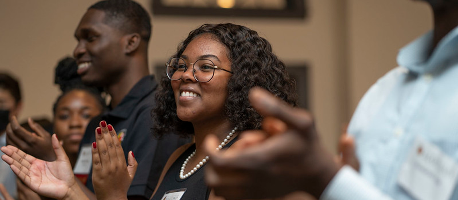 students clapping